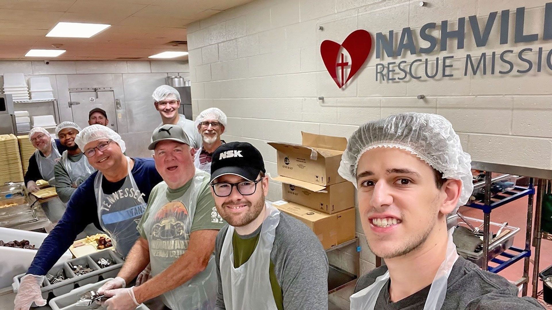 Remnant Fellowship members serving in the food line for breakfast at the Nashville Rescue Mission